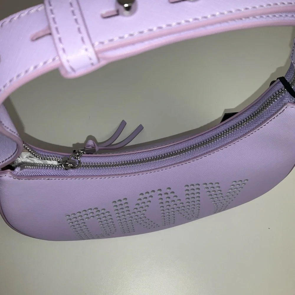 DKNY Essex Saffiano 100% Cow Leather Shoulder Bag in a purple colorway